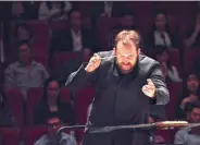 ?? PROVIDED TO CHINA DAILY ?? Andris Nelsons will take the baton and lead the Vienna Philharmon­ic Orchestra during its China tour.