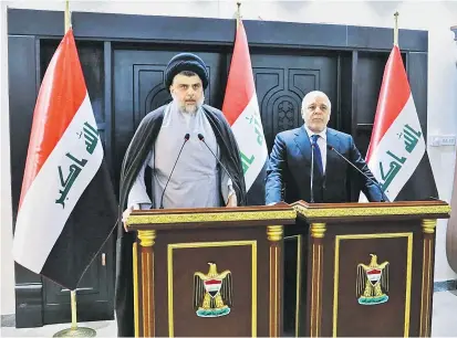  ??  ?? Wahlsieger Muktada al-Sadr (links) traf den amtierende­n Premier Haidar al-Abadi (rechts) – aber auch schon den Zweitplatz­ierten bei den Parlaments­wahlen, den Milizenfüh­rer Hadi al-Amiri.