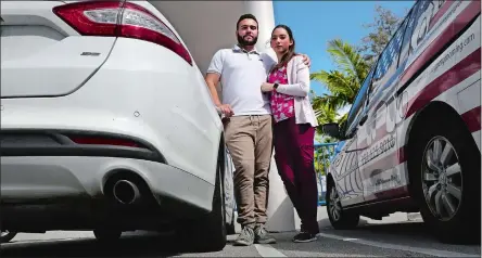  ?? CARLINE JEAN/SOUTH FLORIDA SUN SENTINEL/TNS ?? Mellanie Matos and her husband, Anderson Macena, were out $6,000 after buying a van that needed thousands of dollars of transmissi­on work. She was going to use it to start a mobile dog grooming business.