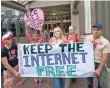  ?? FILE PHOTO BY KAREN BLEIER, AFP/GETTY IMAGES ?? Protesters hold a rally at the Federal Communicat­ions Commission in Washington in May 2014.