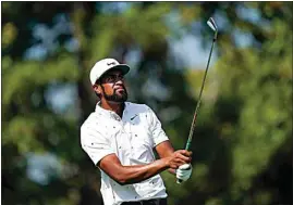  ?? JULIO CORTEZ / AP ?? Tony Finau tees off on the 13th hole during the ProAm at the BMW Championsh­ip on Wednesday at Caves Valley Golf Club in Owings Mills, Md. The BMW Championsh­ip tournament begins today.