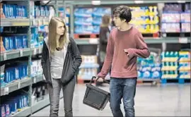  ?? Michael Tackett 20th Century Fox ?? CARA DELEVINGNE and Nat Wolff spend time together before she disappears.