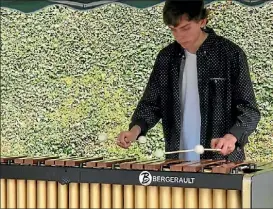  ??  ?? Dominic Jacquemard playing marimba.