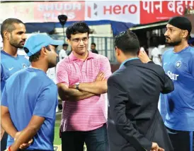  ?? — PTI ?? Sourav Ganguly ( centre) chats with Amit Mishra, Shikhar Dhawan and Harbhajan Singh during the rain break in Kolkata on Thursday.