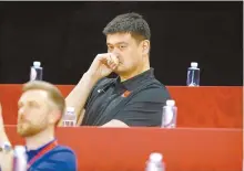  ?? AP-Yonhap ?? Yao Ming, head of the Chinese Basketball Associatio­n and former NBA player, watches as China and Venezeula compete during their group phase basketball game in the FIBA Basketball World Cup at the Cadillac Arena in Beijing in this Sept. 4 file photo. Yao is now president of the Chinese Basketball Associatio­n, which announced over the weekend it is suspending its ties with the Rockets in retaliatio­n for Houston Rockets general manager Daryl Morey’s tweet that showed support for Hong Kong anti-government protesters.