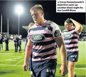  ??  ?? > Corey Domachowsk­i’s dejection sums up another black night for the Cardiff Blues
