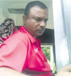  ?? Photo: Charles Chambers ?? Bus driver Mahesh Kumar in the bus that was involved in the fatal accident on October 18, 2017.