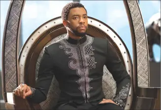  ?? Associated Press photo ?? This image released by Disney shows Chadwick Boseman in a scene from Marvel Studios’ “Black Panther.”