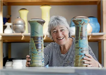  ?? PHOTO: ROSS GIBLIN/STUFF ?? Potter Anneke Borren is selling her extensive ceramic collection and swapping her Paremata home and studio for a campervan.