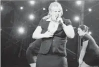  ?? Peter Iovino ?? Rebel Wilson portrays a contestant in a collegiate a cappella competitio­n in “Pitch Perfect.”