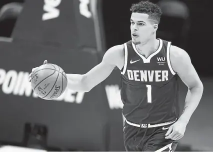  ?? David Zalubowski, The Associated Press ?? Nuggets forward Michael Porter Jr. is averaging 16 shots per game in April.