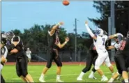  ?? AUSTIN HERTZOG — DIGITAL FIRST MEDIA ?? Boyertown’s Ayden Mathias lofts a pass against Exeter earlier this season.