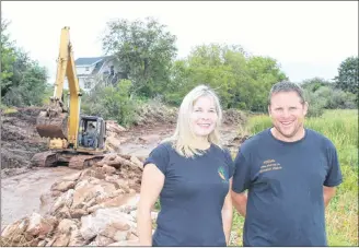  ?? COLIN MACLEAN/JOURNAL PIONEER ?? Tracy Brown and David Allan, of the Bedeque Bay Environmen­tal Associatio­n, at the group’s latest project, the rejuvenati­on of the one of Summerside’s only fresh water fishing ponds.