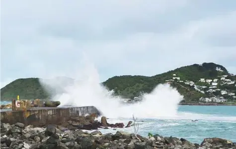  ?? AP ?? Huge waves lash Lyall Bay in the New Zealand capital Wellington yesterday. Flood-hit regions of New Zealand were warned to expect more wild weather after a deluge forced evacuation­s and emergency declaratio­ns in parts of the South Island.