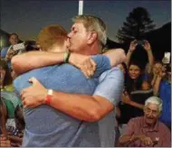  ?? STAN HUDY - SHUDY@DIGITALFIR­STMEDIA.COM ?? Tom Huerter hugs his son, Kevin Huerter, the No. 19 selection in the 2018 NBA Draft by the Atlanta Hawks moments after the announceme­nt during a watch party at the Edison Club.