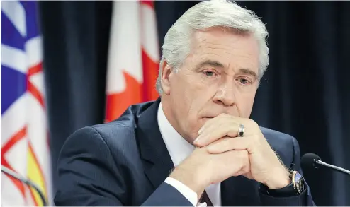  ?? PAUL DALY / THE CANADIAN PRESS ?? Newfoundla­nd Premier Dwight Ball said that while it’s too late to do anything about the cost overruns with the Muskrat Falls hydro electric project a public inquiry that starts in January will help “learn from the past.”