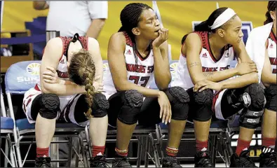  ?? Special to the Democrat-Gazette/JONATHAN BACHMAN ?? Arkansas State players react dejectedly during the second half of the Red Wolves’ 79-68 loss to Appalachia­n State on Tuesday in a firstround game of the Sun Belt Conference Tournament at Lakefront Arena in New Orleans. Arkansas State finished 15-15...