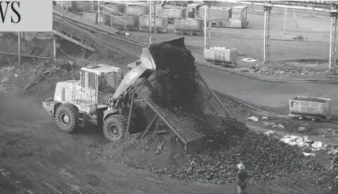  ?? CHINATOPIX VIA AP FILES ?? A coal mine in central China. The state-owned Chinese coal company is responsibl­e for a whopping 14 per cent of global emissions.