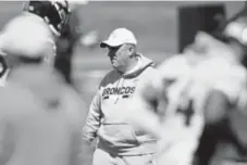  ?? Joe Amon, The Denver Post ?? Broncos coach Vic Fangio executes the Fangio Stare on the practice field.