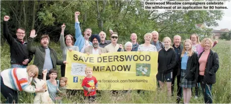  ?? ?? Deerswood Meadow campaigner­s celebrate the withdrawal of an applicatio­n for 80 homes.