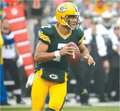  ?? | AP ?? Brett Hundley ( above) completed a combined five passes to Jordy Nelson, Davante Adams and Randall Cobb on Sunday.
