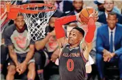  ?? [AP PHOTO] ?? Western Conference guard Russell Westbrook of the Oklahoma City Thunder dunks during Sunday night’s NBA All-Star Game in New Orleans.