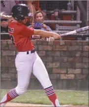  ?? PDN photo by Tom Firme ?? Poteau’s Maggie Wheat hits a three-run home run against Stigler in the sixth inning on Tuesday.