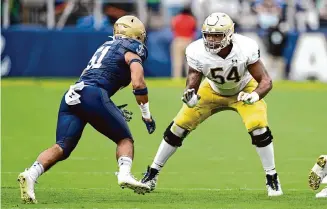  ?? G Fiume/Getty Images ?? Tackle Blake Fisher, right, provides injury insurance for Laremy Tunsil and Tytus Howard.