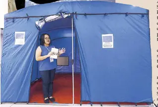  ?? EPA-EFE ?? An NGO coordinato­r explains details on a barrel vault tent funded by the European Union Civil Protection and Humanitari­an Aid during an exhibition in Caloocan City yesterday. The project aims to enable LGUs to provide disaster-stricken communitie­s with affordable, efficient and locally sourced temporary shelters to preserve quality of life in times of emergency.