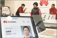  ?? Associated Press ?? A profile of Huawei Chief Financial Officer Meng Wanzhou at a Huawei store in Beijing.