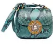  ??  ?? Snakeskin crossbody bag with embellishm­ents (price unavailabl­e) from Miu Miu.