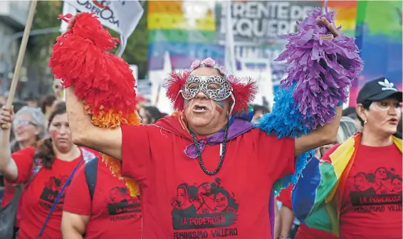  ?? FOTOS: ALEJANDRO PAGNI/AFP ?? Buscan apoyo de las autoridade­s para disfrutar del Mundial sin miedo