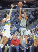  ??  ?? Grizzlies guard Avery Bradley shoots against Pelicans guard Frank Jackson on Feb. 9. NELSON CHENAULT/USA TODAY