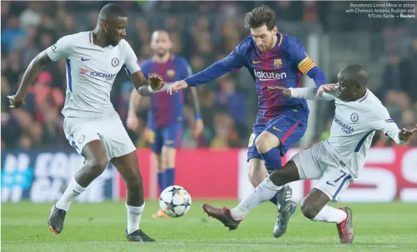  ??  ?? Barcelona’s Lionel Messi in action with Chelsea’s Antonio Rudiger and N’golo Kante. — Reuters