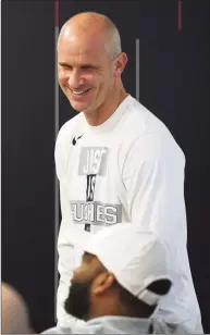  ?? Tyler Sizemore / Hearst Connecticu­t Media ?? UConn men’s basketball coach Dan Hurley leads a meeting with assistant coaches before practice at the Werth Family UConn Basketball Champions Center on June 9.