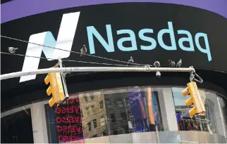  ?? AFP/GETTY IMAGES ?? Gaining a listing on Nasdaq should make Cronos Group Inc. more attractive to U.S. investors looking to play the cannabis legalizati­on boom and also give the company easier access to capital.