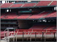  ?? (AP/Jeff Roberson) ?? Empty seats are seen inside Busch Stadium in St. Louis on Wednesday. Major League Baseball’s regular season was set to begin today but is on hold indefinite­ly because of the coronaviru­s pandemic.