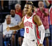  ?? ASSOCIATED PRESS ?? Ohio State guard Meechie Johnson Jr. connected on a game-ending 3-pointer Monday night against Seton Hall after losing the ball 12 seconds earlier.