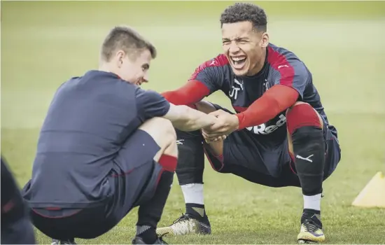  ??  ?? James Tavernier enjoys his stretching exercises as Rangers prepare for this afternoon’s Ladbrokes Premiershi­p clash with Hearts at Ibrox.