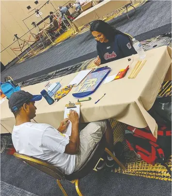  ?? — ConRAd BASSeTT-BoUCHARd ?? Siblings Dean and Dielle Saldanha competed at the National Scrabble Championsh­ip in Reno in July. They now head to an internatio­nal tourney.