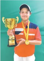  ?? ?? Anson Yeo poses with his trophy and medal.