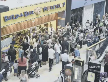  ??  ?? Hundreds of shoppers queued outside the Build-a-bear store in Edinburgh’s Ocean Terminal