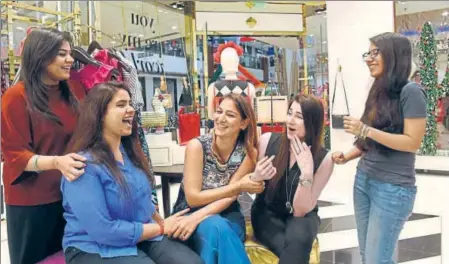  ?? SAUMYA KHANDELWAL/HT ?? Aaditi Sardana (left), head — marketing for retail stores, and Garima Gakhar (second from left), assistant manager, leasing, with their colleagues at Select Citywalk in Delhi’s Saket. Both appreciate the fact that every employee has a voice in their...