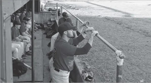  ?? CHRIS SAULNIER ?? Mitch Donnelly, front, is pictured with some of his teammates May 30 at Memorial Park in Kentville.