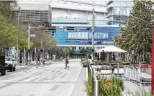  ?? Steve Gonzales / Staff photograph­er ?? Avenida De Las Americas at the George R. Brown Convention Center was nearly empty in late March because of the pandemic.