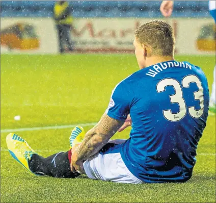  ??  ?? SEASON’S END? Martyn Waghorn holds his knee during Rangers’ Scottish Cup win over Kilmarnock