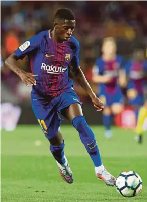  ?? REUTERS PIC ?? Ousmane Dembele in action on his debut for Barcelona in their 5-0 defeat of Espanyol on Saturday.