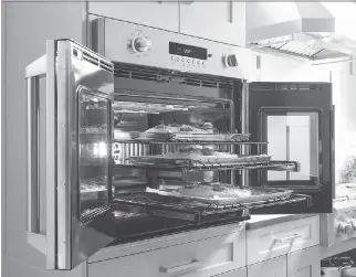  ??  ?? The French Door Wall Oven, by luxury appliances company Monogram, targets baby boomers with doors that open wide and racks that fully extend, making it easy to move things in and out without reaching or bending over.
