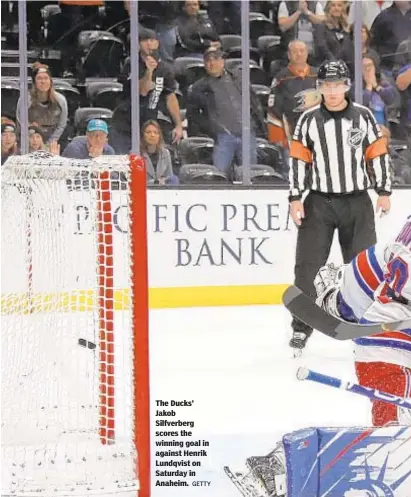  ?? GETTY ?? The Ducks’ Jakob Silfverber­g scores the winning goal in against Henrik Lundqvist on Saturday in Anaheim.