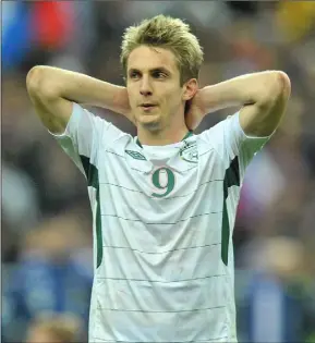  ??  ?? A dejected Kevin Doyle after France ended his dream of playing in the 2010 World Cup.